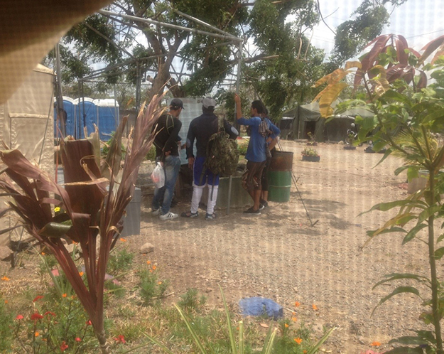 Recent arrivals receive instructions at a migrant shelter in Costa Rica, Photo: Nanneke Winters, April/May 2019